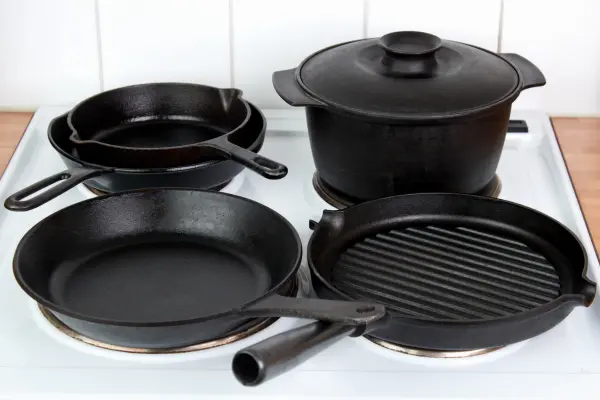 Induction Stove Pans & Cookware: Expert Tips for Buyers 3 cast iron cookware on induction stove
