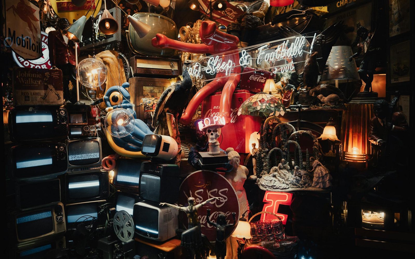 Explore a retro Istanbul thrift shop with vintage TVs and eclectic art displays.