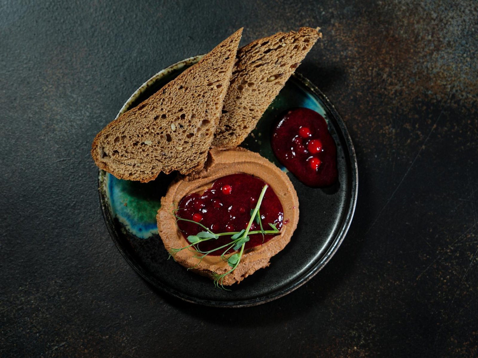 Stove Repair Guide for Home Cooks on a Budget 3 Artistic still life of wholemeal bread with cranberry jam on pâté, perfect for breakfast or snack.