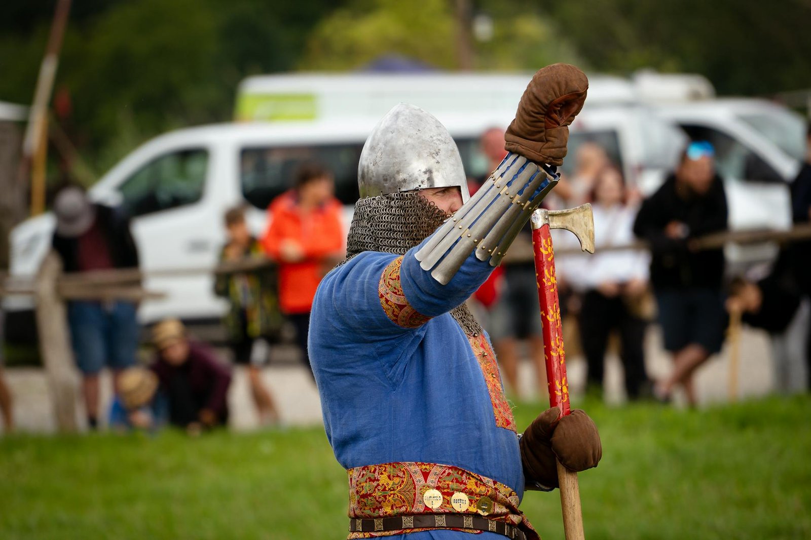 A Viking reenactor in armor at a historical event in Szczecin, Poland.